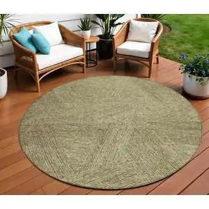 Photo of 8' Green Beige And Brown Round Abstract Washable Indoor Outdoor Area Rug