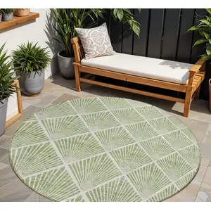 Photo of 8' Green Beige And Ivory Round Geometric Washable Indoor Outdoor Area Rug