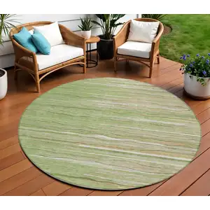 Photo of 8' Green Beige And Ivory Round Striped Washable Indoor Outdoor Area Rug