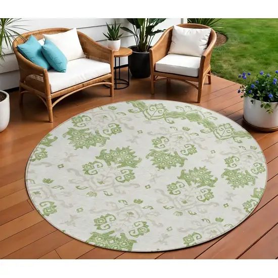 8' Green Beige And Taupe Round Oriental Washable Indoor Outdoor Area Rug Photo 1