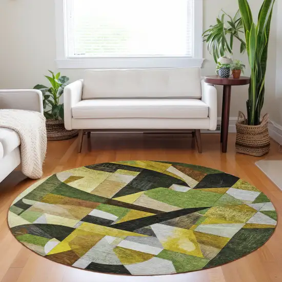 8' Green Black Gold And Beige Round Abstract Washable Indoor Outdoor Area Rug Photo 7