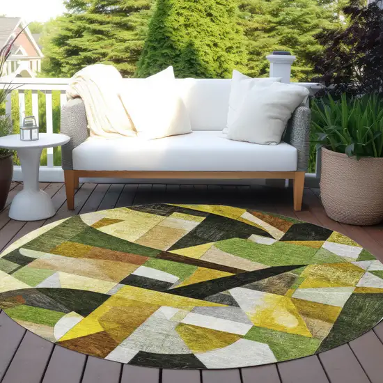 8' Green Black Gold And Beige Round Abstract Washable Indoor Outdoor Area Rug Photo 6