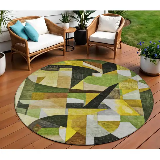 8' Green Black Gold And Beige Round Abstract Washable Indoor Outdoor Area Rug Photo 2