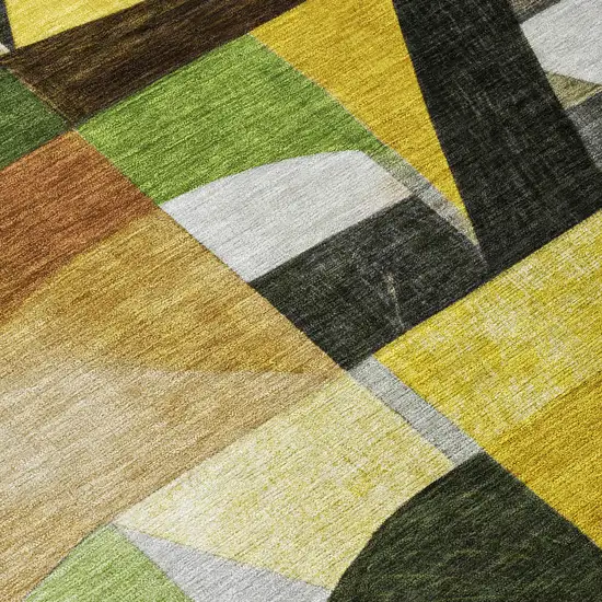 8' Green Black Gold And Beige Round Abstract Washable Indoor Outdoor Area Rug Photo 8