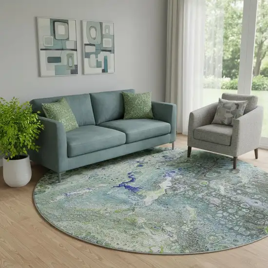 8' Green Blue And Ivory Abstract Washable Round Rug With UV Protection Photo 1