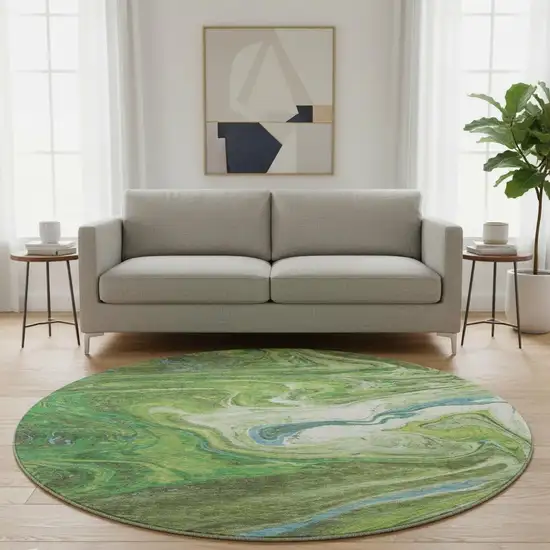 8' Green Blue And Ivory Abstract Washable Round Rug With UV Protection Photo 2