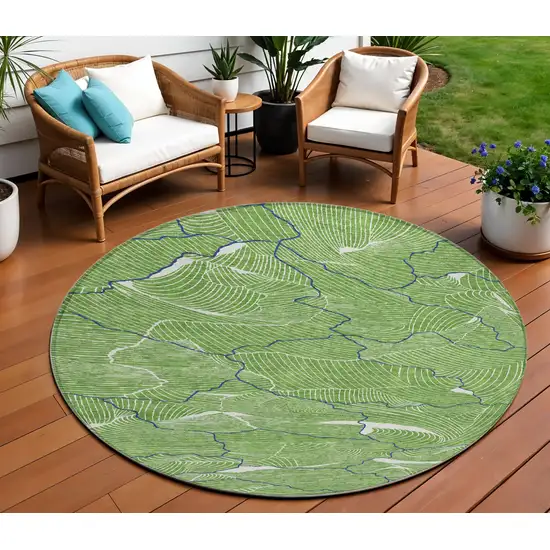 8' Green Blue And Ivory Round Abstract Washable Indoor Outdoor Area Rug Photo 1