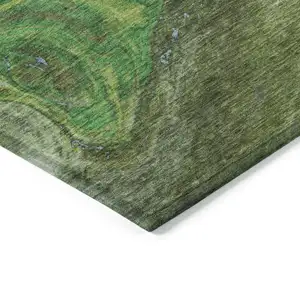 Photo of 8' Green Blue And Ivory Round Abstract Washable Indoor Outdoor Area Rug