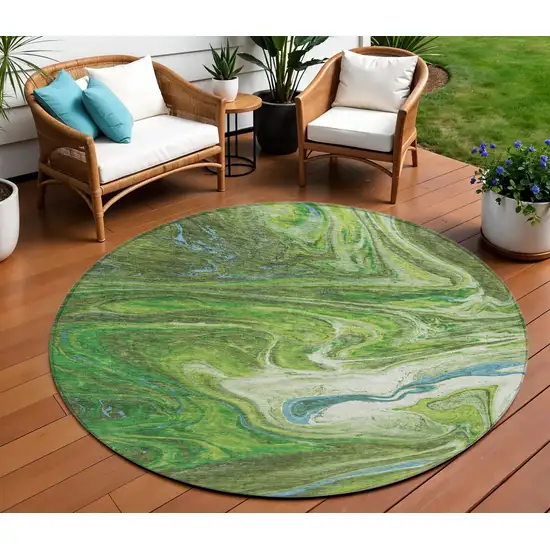 8' Green Blue And Ivory Round Abstract Washable Indoor Outdoor Area Rug Photo 1