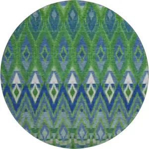 Photo of 8' Green Blue And Ivory Southwestern Washable Round Rug With UV Protection