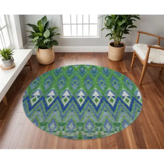 8' Green Blue And Ivory Southwestern Washable Round Rug With UV Protection Photo 2