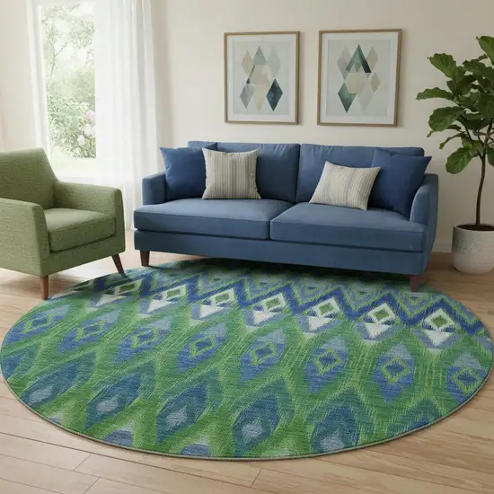 8' Green Blue And Ivory Southwestern Washable Round Rug With UV Protection Photo 1