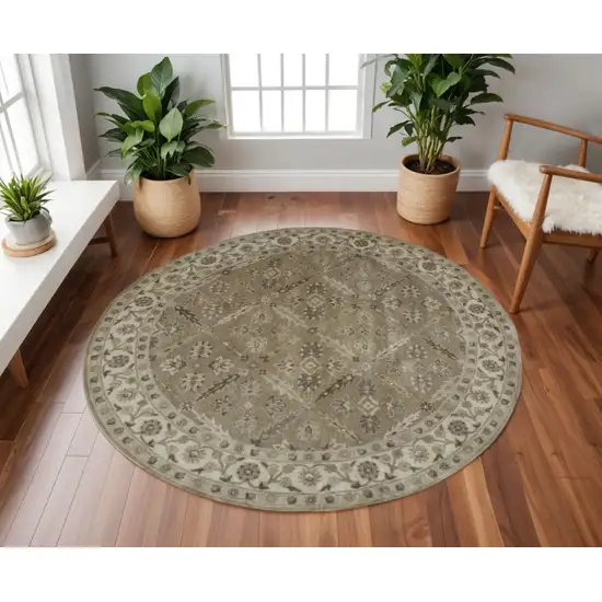8' Green Brown And Taupe Round Wool Paisley Tufted Handmade Stain Resistant Area Rug Photo 1