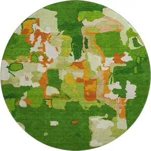Photo of 8' Green Copper And Orange Abstract Washable Round Rug With UV Protection