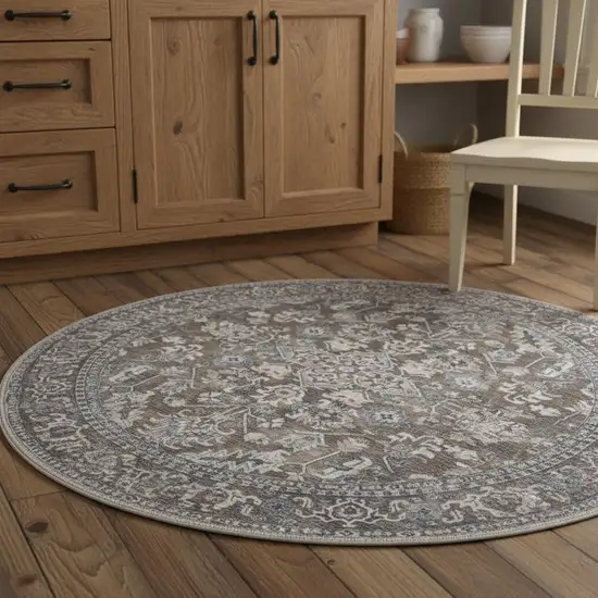 4' Green Floral Power Loom Worn Faded Round Rug Photo 1