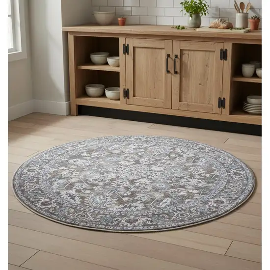 5' Green Floral Power Loom Worn Faded Round Rug Photo 1