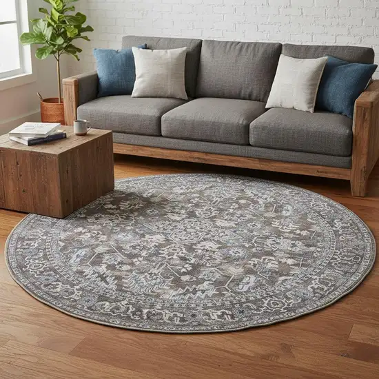 8' Green Floral Power Loom Worn Faded Round Rug Photo 1