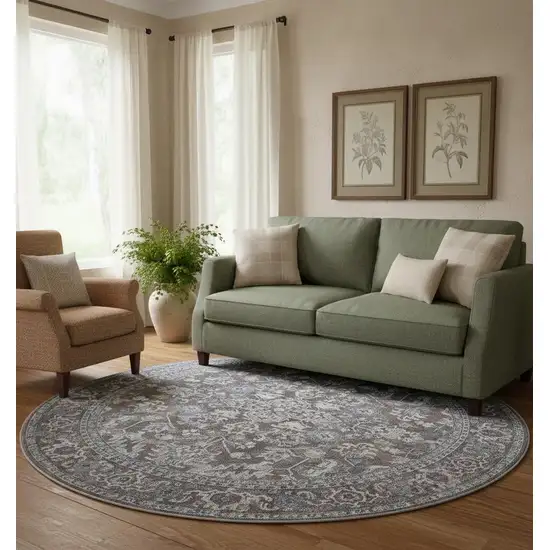 8' Green Floral Power Loom Worn Faded Round Rug Photo 1