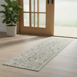 Photo of 6' Green Floral Worn Faded Runner Rug