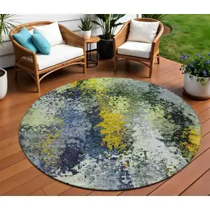Photo of 8' Green Gold And Charcoal Round Abstract Washable Indoor Outdoor Area Rug