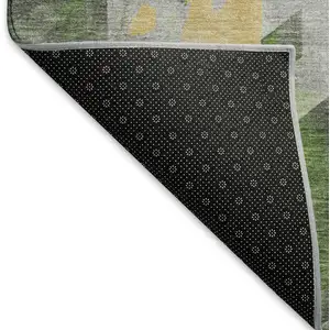 Photo of 8' Green Gold And Gray Geometric Washable Round Rug With UV Protection