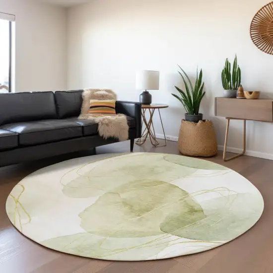 8' Green Gold And Ivory Abstract Washable Round Rug With UV Protection Photo 5