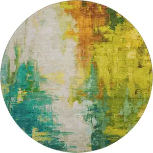 Photo of 8' Green Gold And Orange Abstract Washable Round Rug With UV Protection