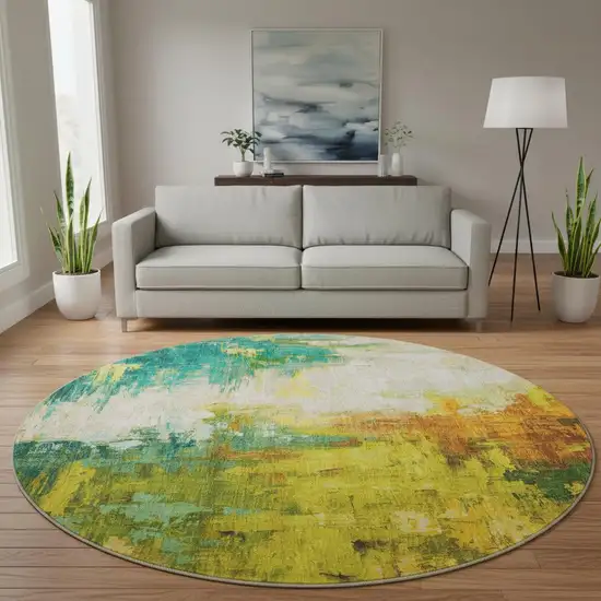 8' Green Gold And Orange Abstract Washable Round Rug With UV Protection Photo 1