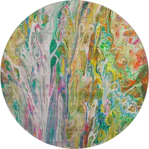 Photo of 8' Green Gold And Teal Abstract Washable Round Rug With UV Protection