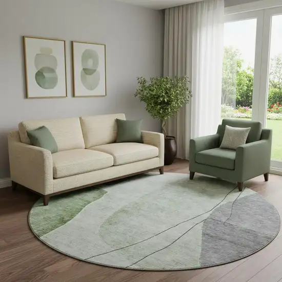 8' Green Gray And Ivory Abstract Washable Round Rug With UV Protection Photo 1