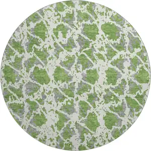 Photo of 8' Green Gray And Ivory Abstract Washable Round Rug With UV Protection