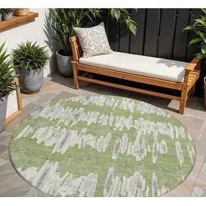 Photo of 8' Green Gray And Ivory Round Striped Washable Indoor Outdoor Area Rug