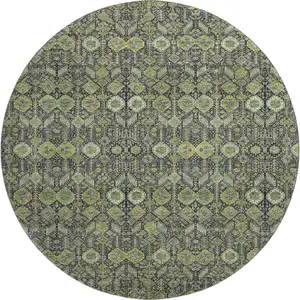 Photo of 8' Green Gray And Ivory Tribal Washable Round Rug With UV Protection
