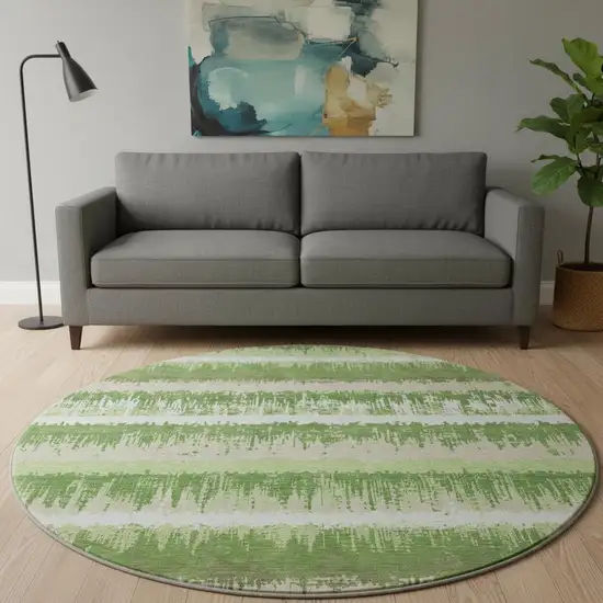 8' Green Ivory And Beige Striped Washable Round Rug With UV Protection Photo 2
