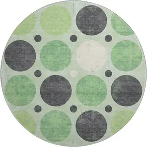 Photo of 8' Green Ivory And Charcoal Geometric Washable Round Rug With UV Protection