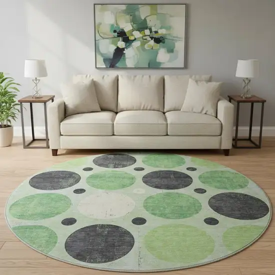 8' Green Ivory And Charcoal Geometric Washable Round Rug With UV Protection Photo 2