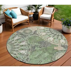 Photo of 8' Green Ivory And Gold Round Paisley Washable Indoor Outdoor Area Rug