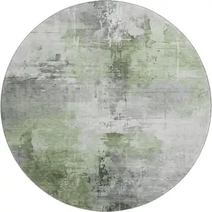 Photo of 8' Green Ivory And Gray Abstract Washable Round Rug With UV Protection