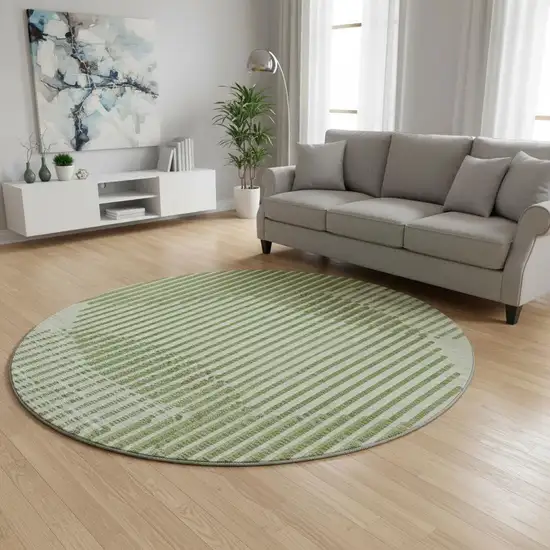 8' Green Ivory And Gray Geometric Washable Round Rug With UV Protection Photo 2