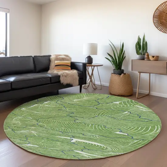 8' Green Ivory And Navy Blue Abstract Washable Round Rug With UV Protection Photo 4
