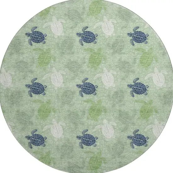 8' Green Ivory And Navy Blue Geometric Washable Round Rug With UV Protection Photo 3