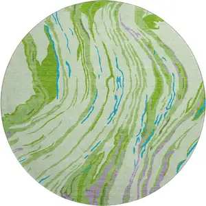 Photo of 8' Green Lavender And Teal Abstract Washable Round Rug With UV Protection