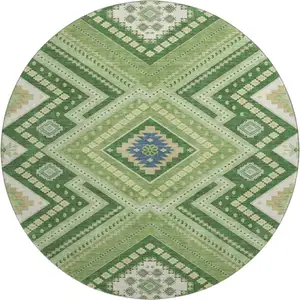 Photo of 8' Green Navy Blue And Ivory Tribal Washable Round Rug With UV Protection