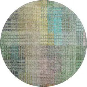 Photo of 8' Green Orange And Blue Abstract Geometric Washable Round Rug With UV Protection