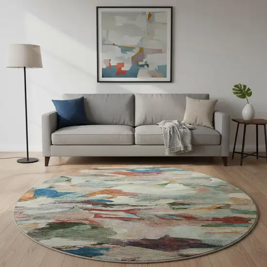 8' Green Orange And Teal Abstract Washable Round Rug With UV Protection Photo 2