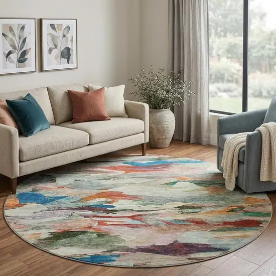 8' Green Orange And Teal Abstract Washable Round Rug With UV Protection Photo 1