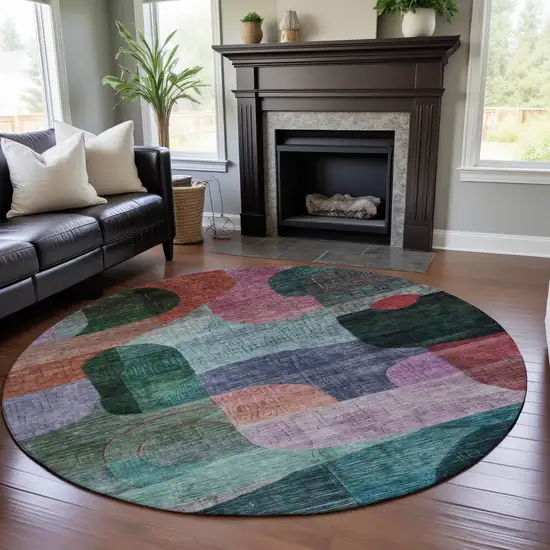 8' Green Orange Purple And Teal Abstract Geometric Washable Round Rug With UV Protection Photo 4