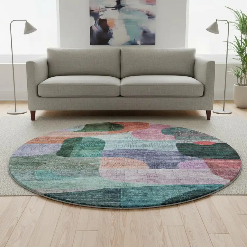 8' Green Orange Purple And Teal Abstract Geometric Washable Round Rug With UV Protection Photo 2