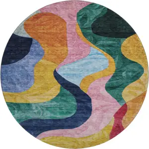 Photo of 8' Green Orange Teal And Pink Abstract Washable Round Rug With UV Protection