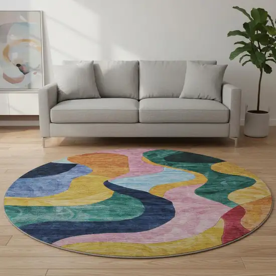 8' Green Orange Teal And Pink Abstract Washable Round Rug With UV Protection Photo 2